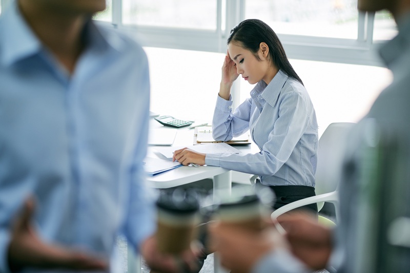 An employee being ostracized after being a whistleblower for workplace harassment.
